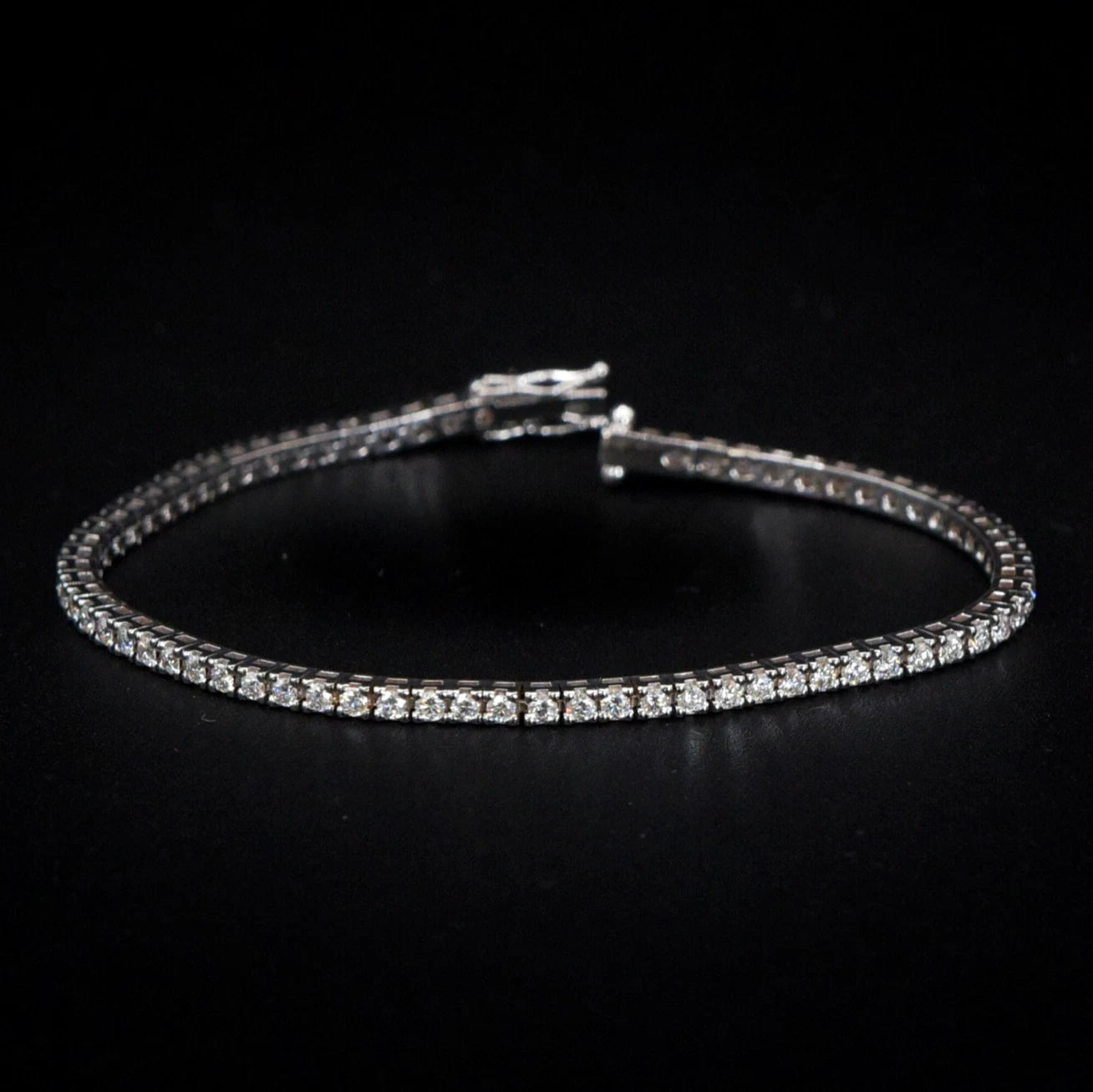 Bracciale tennis griffe oro bianco 18kt 2.60ct F VVS