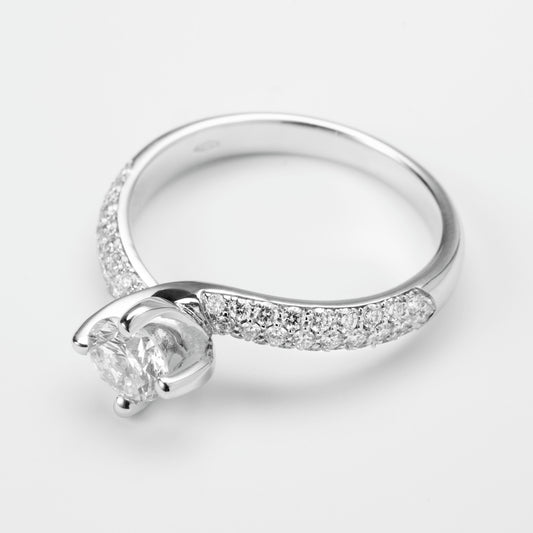 Anello solitario Valentino diamante 0.60ct G VS2 mezzo pavé oro bianco 18kt