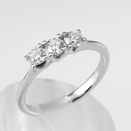 Anello trilogy diamante 0.60 ct F VVS oro bianco 18kt