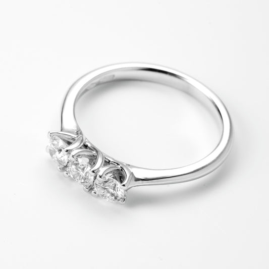 Anello trilogy diamante 0.60 ct F VVS oro bianco 18kt