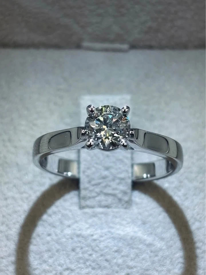 Valentino solitaire ring diamond 0.60ct G VS2 half pavé 18kt white gold